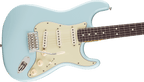 Angled view of the Daphne Blue Stratocaster body: master volume and two tone knobs, five-way blade switch, aged-white pickup covers and the chrome six-saddle tremolo