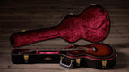 Taylor 322ce in the included black hardshell case with red plush interior