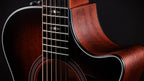 Venetian cutaway and mahogany side meeting the satin mahogany top of the Taylor 322ce