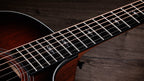 Crelicam ebony fingerboard with faux pearl Gemstone inlays on the Taylor 322ce