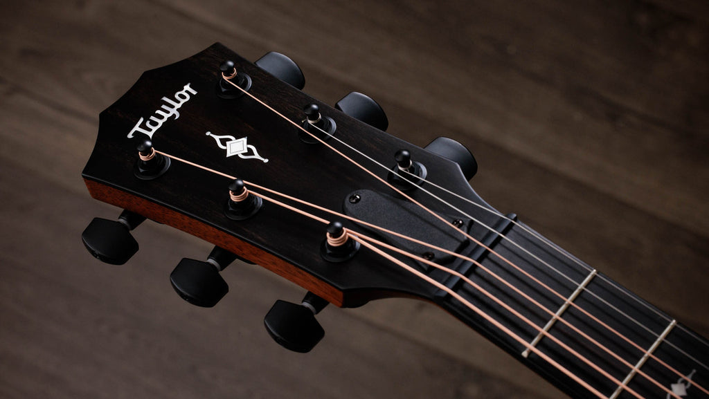 Taylor 322ce paddle headstock with satin black tuners and black Tusq nut