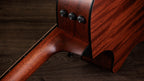 Side-mounted ES2 volume and EQ dials on the mahogany upper bout