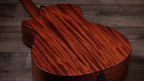 Solid two-piece mahogany back of the Taylor 322ce with black binding