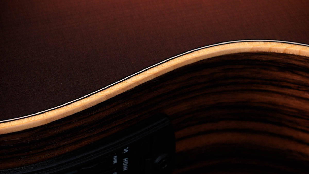 Cream body binding with black-and-white purfling above the side-mounted ES-B controls