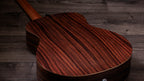 Rear three-quarter view showing the layered Indian rosewood back grain