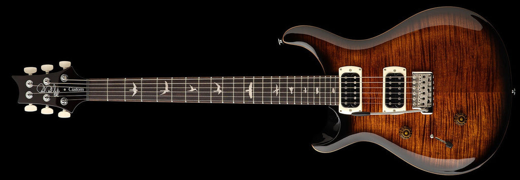 Left-handed PRS SE Custom 24 in Black Gold Sunburst, full front view with flame maple top and cream pickup rings
