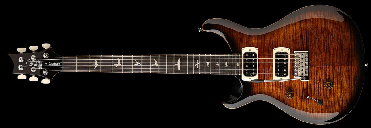 Left-handed PRS SE Custom 24 in Black Gold Sunburst, full front view with flame maple top and cream pickup rings