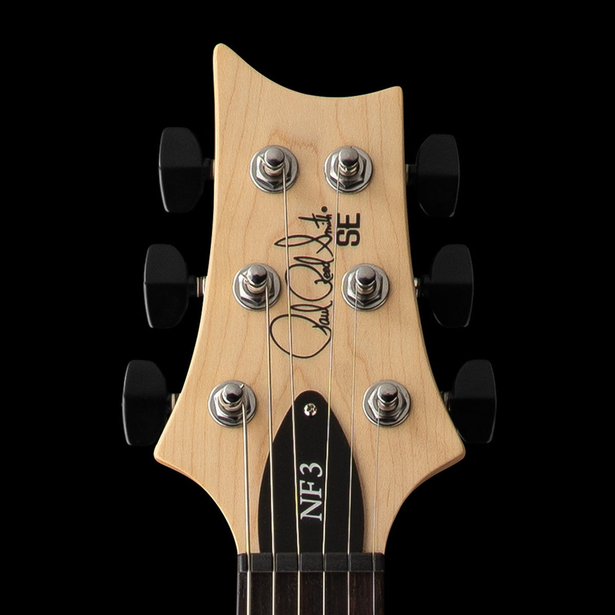 Natural maple PRS SE NF3 headstock with black wing-button tuners and NF3 truss rod cover