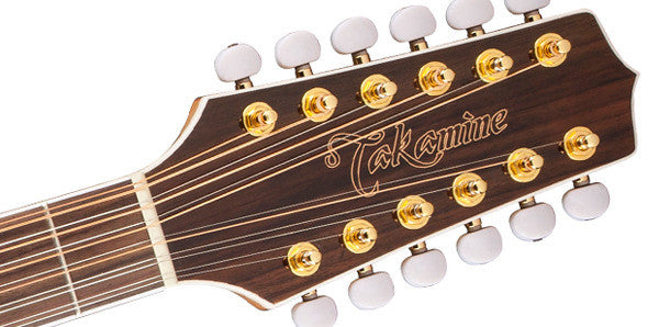 Bound black walnut headstock of the Takamine GJ72CE-12 NAT with gold die-cast tuners, pearl buttons and the gold Takamine script logo