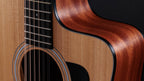 Venetian cutaway and layered sapele side meeting the spruce top of the Taylor 150ce